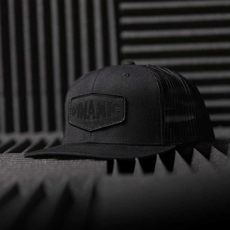 Dynamic Trucker Hat Black Out / Embroidered Patch